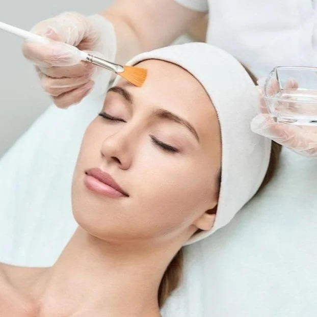 Professional facial treatment in progress